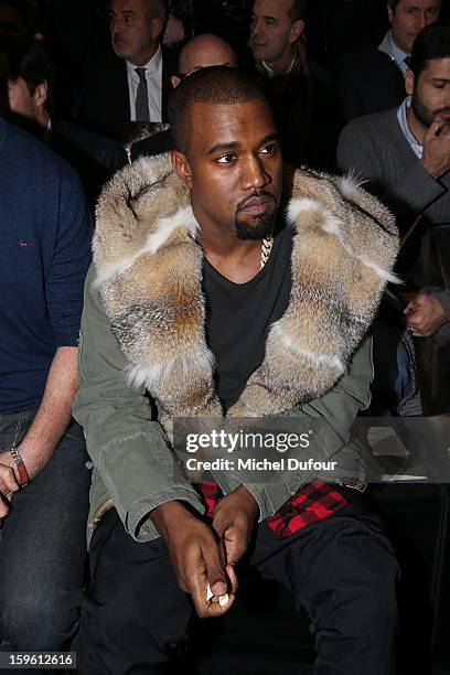 Kanye West attends the Louis Vuitton Men Autumn / Winter 2013 show as part of Paris Fashion Week on January 17, 2013 in Paris, France.