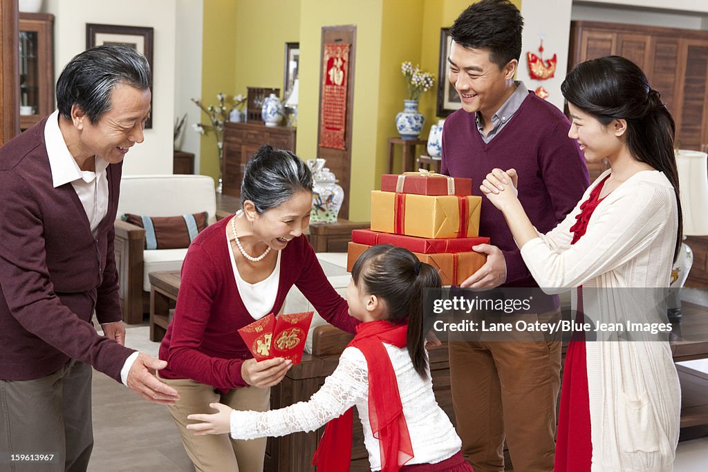 Family visiting with gifts during Chinese New Year