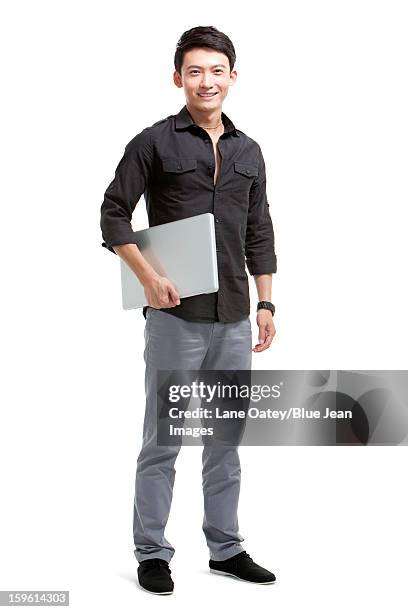 confident  young man with laptop - asiatischer mann freigestellt stock-fotos und bilder