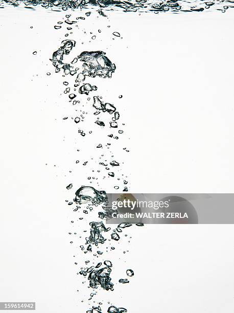close up of bubbles in water - bubbles white background stock pictures, royalty-free photos & images