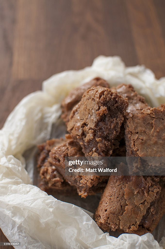 Chocolate brownies in wax paper