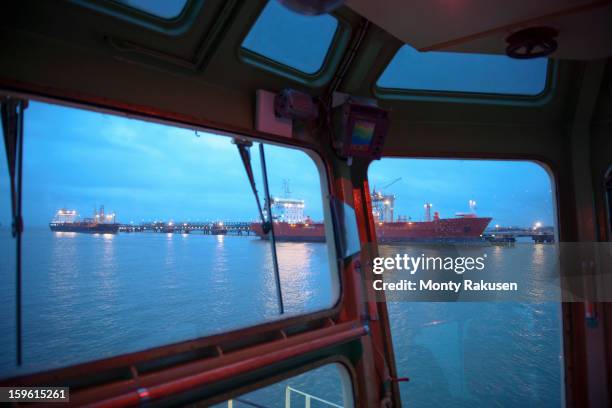 view of tankers out to sea from tug - ship's bridge foto e immagini stock