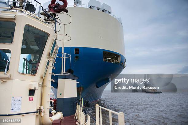 tugs and ship at sea - ship captain stock pictures, royalty-free photos & images