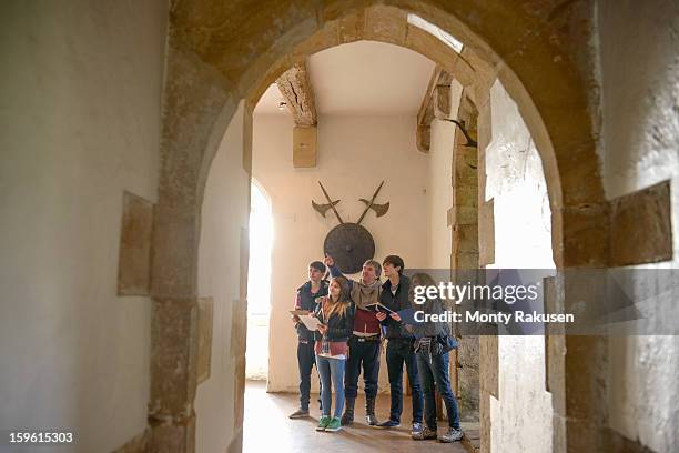 history student with teacher, bolton castle, a 14th century grade 1 listed building and scheduled ancient monument - history lesson stock pictures, royalty-free photos & images