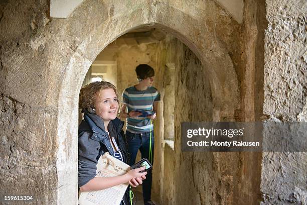 history students and audio guide, bolton castle, 14th century grade 1 listed building, scheduled ancient monument - field trip stock pictures, royalty-free photos & images