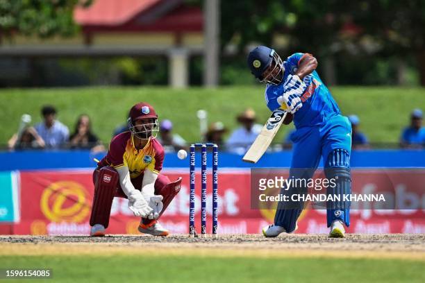 Sanju Samson, of India takes a shot during the fifth and final T20I match between West Indies and India at the Central Broward Regional Park in...