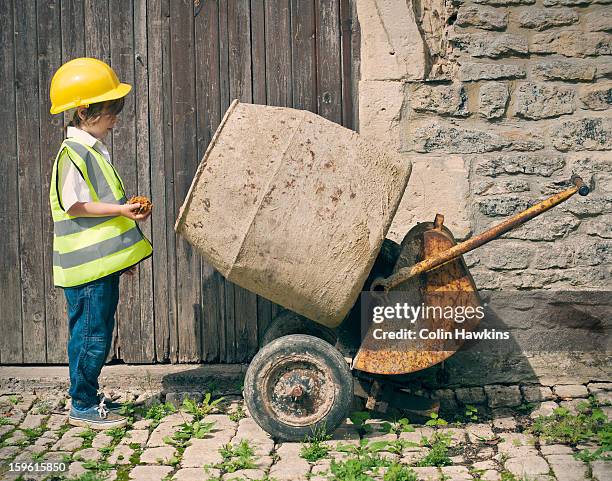 boy playing construction with mixer - betonmischer stock-fotos und bilder