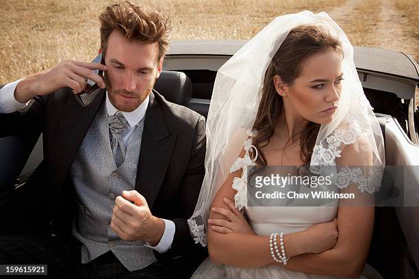 newlywed couple arguing in car - europe bride stock pictures, royalty-free photos & images