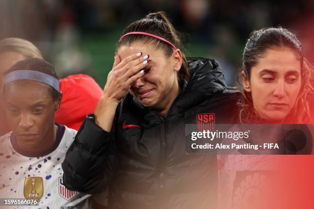 Alex Morgan of USA is seen crying as she reacts to her team being knocked out of the tournament after a penalty shoot out loss during the FIFA...