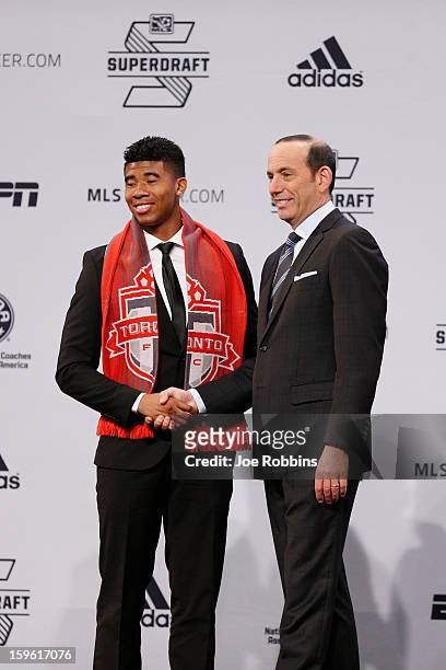 Emory Welshman of Oregon State shakes hands with commissioner Don Garber after being selected by Toronto FC as the 16th overall pick in the 2013 MLS...