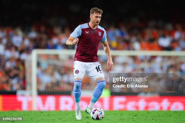 Calum Chambers of Aston Villa run with the ball during the Trofeu Taronja match between Valencia CF and Aston Villa at Estadio Mestalla on August 05,...