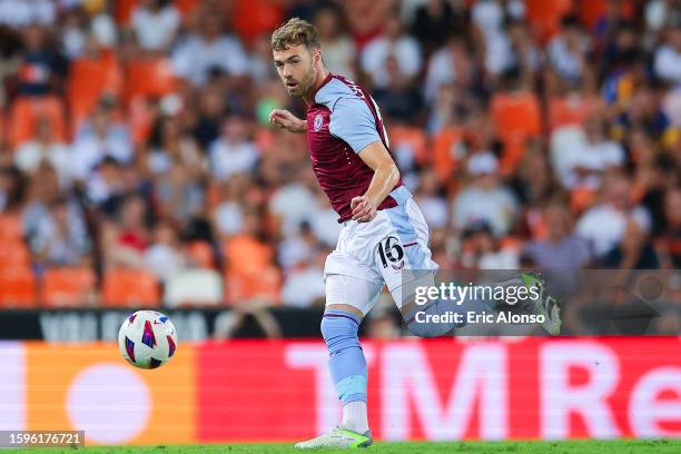 Calum Chambers of Aston Villa run with the ball during the Trofeu Taronja match between Valencia CF and Aston Villa at Estadio Mestalla on August 05,...