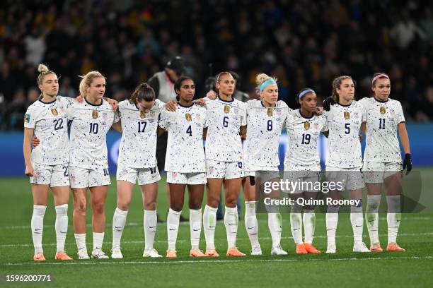 Players line up as Megan Rapinoe of USA takes the team's fourth penalty during the penalty shootout in the FIFA Women's World Cup Australia & New...