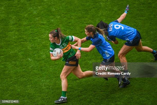 Dublin , Ireland - 13 August 2023; Anna Galvin of Kerry gets away from Aoife Kane, centre, and Eilish O'Dowd of Dublin during the 2023 TG4 LGFA...