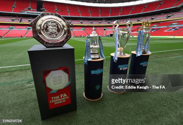 Detailed view of the FA Community Shield, the FA Cup Trophy, UEFA Champions League Trophy and Premier League Trophy prior to The FA Community Shield...