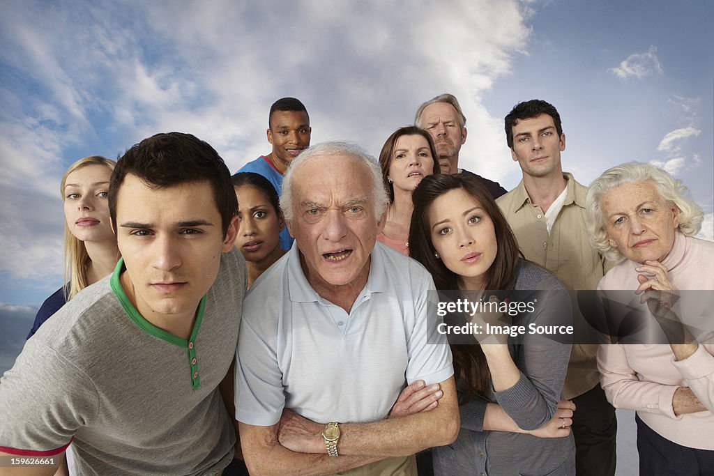 Group of people looking angrily at camera