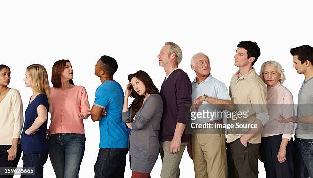 people in a queue, becoming impatient - impatient stock pictures, royalty-free photos & images