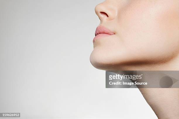 womans jaw, low angle - human jaw bone stockfoto's en -beelden