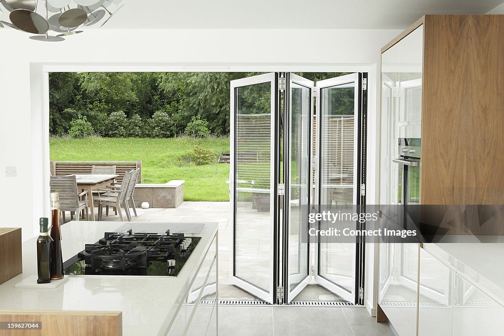 Kitchen with open patio doors