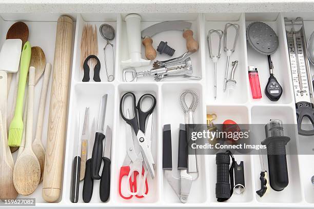 utensils in kitchen drawer - drawer stock pictures, royalty-free photos & images
