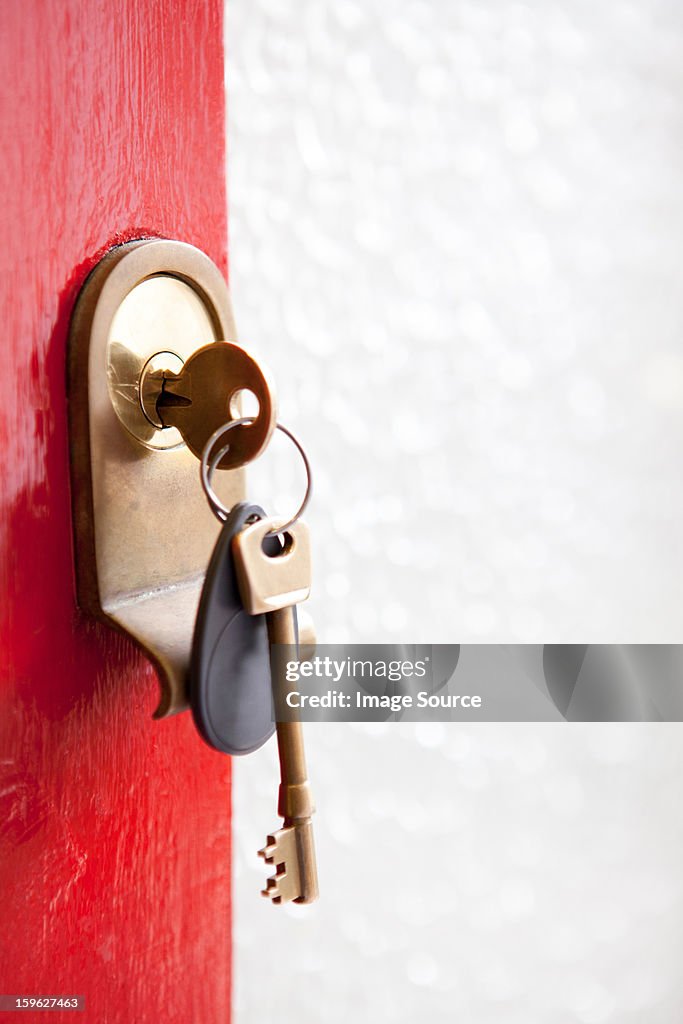 Close up of house keys in front door