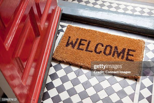 welcome mat - red tile stock pictures, royalty-free photos & images