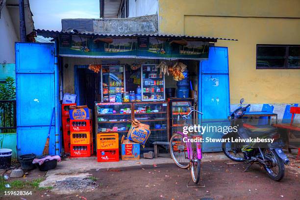 People have attached an additional shed-like structure to the front of their home, creating a small space to display the goods on sale. This is...