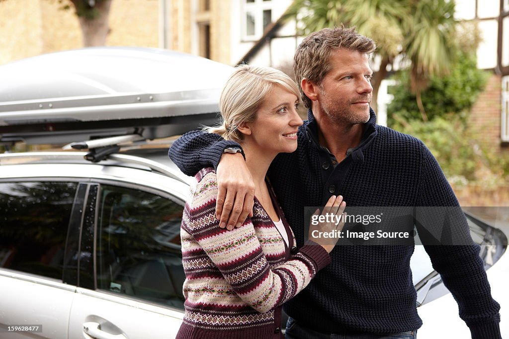 Couple by car