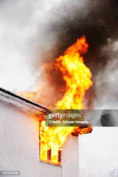 flames coming out of window - blaze stock pictures, royalty-free photos & images