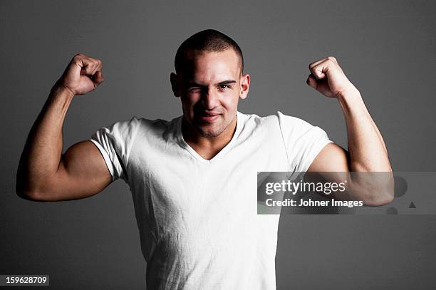 portrait of a man. - gray shirt stock pictures, royalty-free photos & images