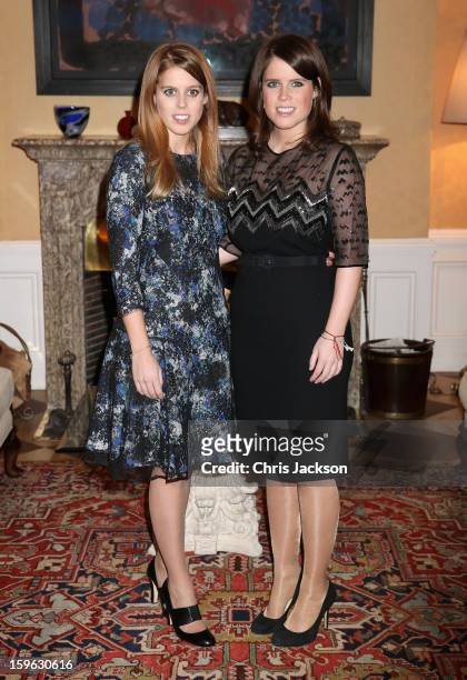 Princess Beatrice and Princess Eugenie of York pose for a photograph at the British Ambassador's Residence on January 17, 2013 in Berlin, Germany....