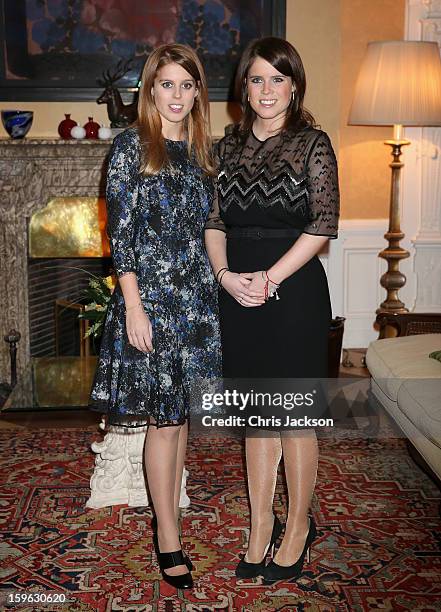 Princess Beatrice and Princess Eugenie of York pose for a photograph at the British Ambassador's Residence on January 17, 2013 in Berlin, Germany....