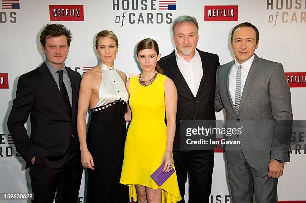 Beau Willimon, Robin Wright, Kate Mara, David Fincher and Kevin Spacey attend the red carpet premiere for the launch of Netflix Original Series...