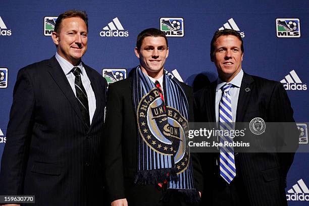 Don Anding of Northeastern University poses for photos with team officials after being selected by Philadelphia Union as the 26th overall pick in the...