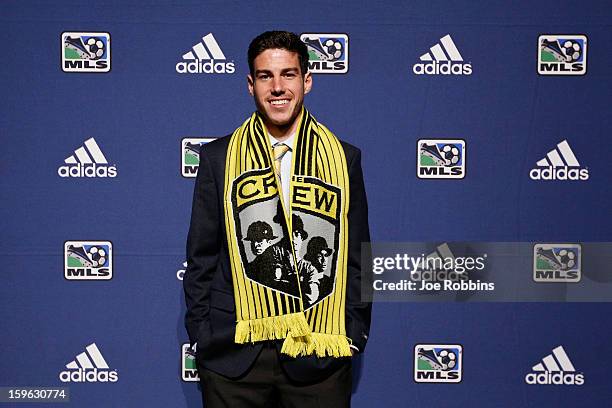 Drew Beckie of the University of Denver poses for photos after being selected by the Columbus Crew as the 28th overall pick in the 2013 MLS...
