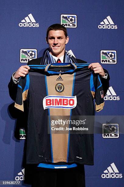 Don Anding of Northeastern University poses for photos after being selected by Philadelphia Union as the 26th overall pick in the 2013 MLS SuperDraft...