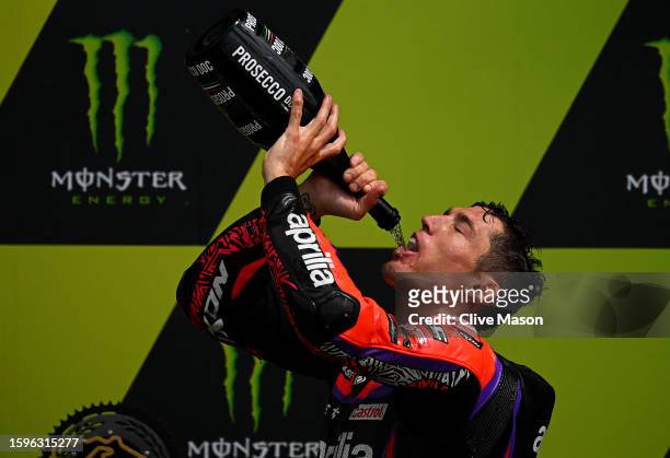 Aleix Espargaro of Spain celebrates his win on the podium after the MotoGP of Great Britain - Race at Silverstone Circuit on August 06, 2023 in...