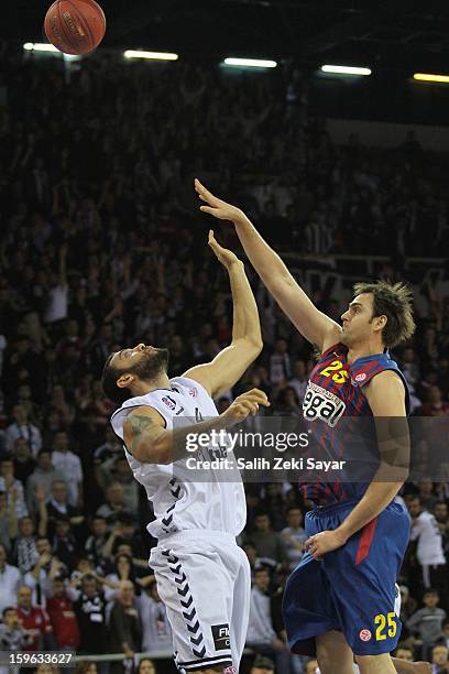 Erazem Lorbek of FC Barcelona Regal competes with Cevher Ozer of Besiktas JK Istanbul during the 2012-2013 Turkish Airlines Euroleague Top 16 Date 4...