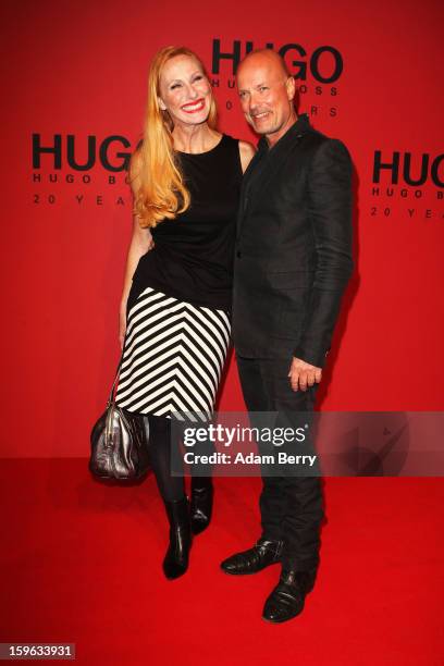 Andrea Sawatzki and Christian Berkel attend Hugo By Hugo Boss Autumn/Winter 2013/14 fashion show during Mercedes-Benz Fashion Week Berlin at The...