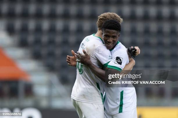 Lommel's Vancsa Zalan and Lommel's Karim Dermane celebrate after winning a soccer match between KV Oostende and Lommel SK, Sunday 13 August 2023 in...