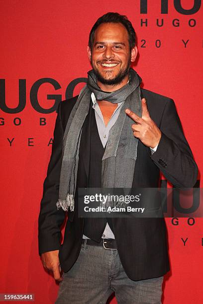 Moritz Bleibtreu attends Hugo By Hugo Boss Autumn/Winter 2013/14 fashion show during Mercedes-Benz Fashion Week Berlin at The Brandenburg Gate on...