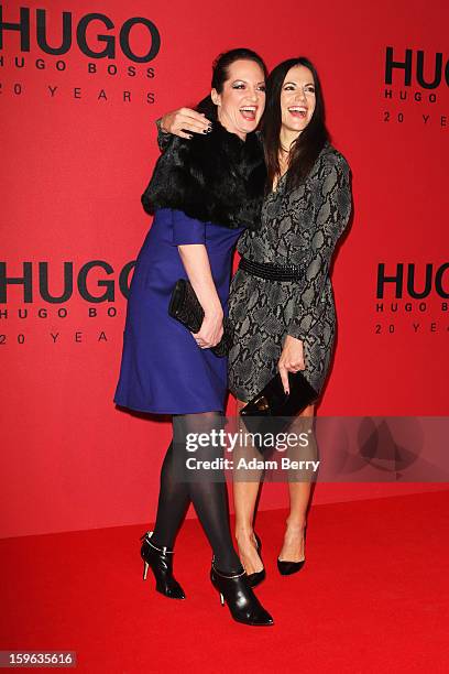 Natalia Woerner and Bettina Zimmermann attend Hugo By Hugo Boss Autumn/Winter 2013/14 fashion show during Mercedes-Benz Fashion Week Berlin at The...