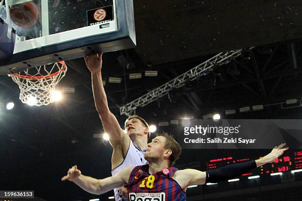 Gasper Vidmar of Besiktas JK Istanbul competes with C.J. Wallace of FC Barcelona Regal during the 2012-2013 Turkish Airlines Euroleague Top 16 Date 4...