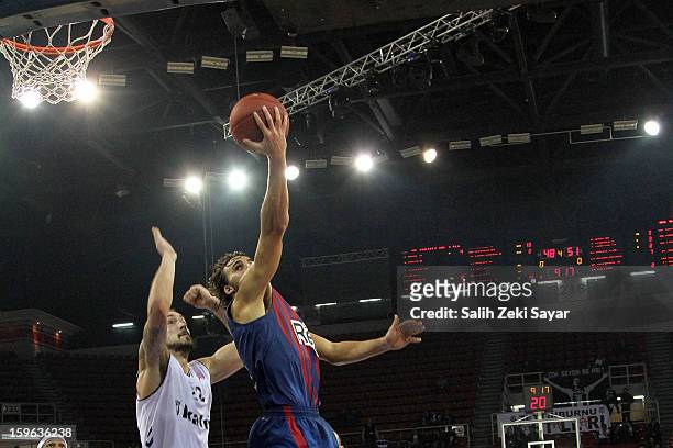 Victor Sada of FC Barcelona Regal competes with Damir Markota of Besiktas JK Istanbul during the 2012-2013 Turkish Airlines Euroleague Top 16 Date 4...