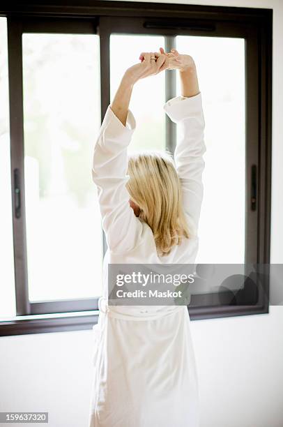 Stretching In Front Of Window Photos and Premium High Res Pictures ...