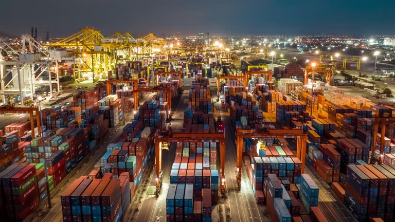 https://media.gettyimages.com/id/1596381143/video/aerial-view-industrial-port-with-container-port-where-is-a-part-of-shipping.jpg?b=1&s=640x640&k=20&c=hQQT0hHNmUobH8p9NxOi-BJObGN0BZ4AsZMhnoOsdCg=