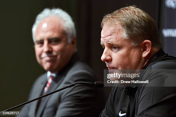 Owner Jeffrey Lurie of the Philadelphia Eagles watches new head coach Chip Kelly address the media at the NovaCare Complex on January 17, 2013 in...