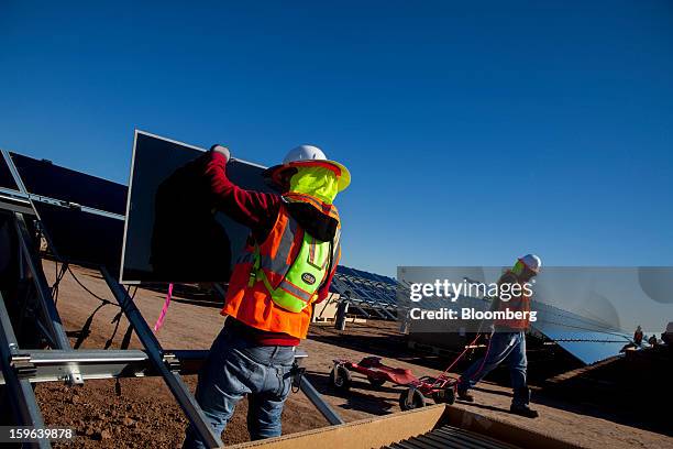 Contractors for First Solar Inc. Work on construction of the Tenaska Imperial Solar Energy Center South project in Imperial County, California, U.S.,...