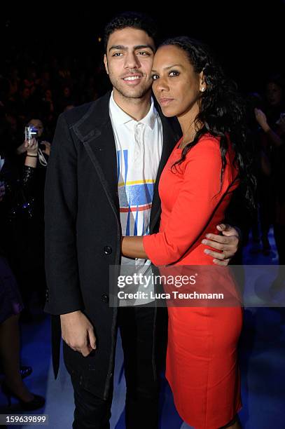 Noah Becker and Barbara Becker attend the Laurel Autumn/Winter 2013/14 fashion show during Mercedes-Benz Fashion Week Berlin at Brandenburg Gate on...