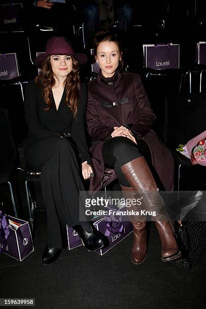 Elisa Schmidt and Peri Baumeister attend the Laurel Autumn/Winter 2013/14 fashion show during Mercedes-Benz Fashion Week Berlin at Brandenburg Gate...